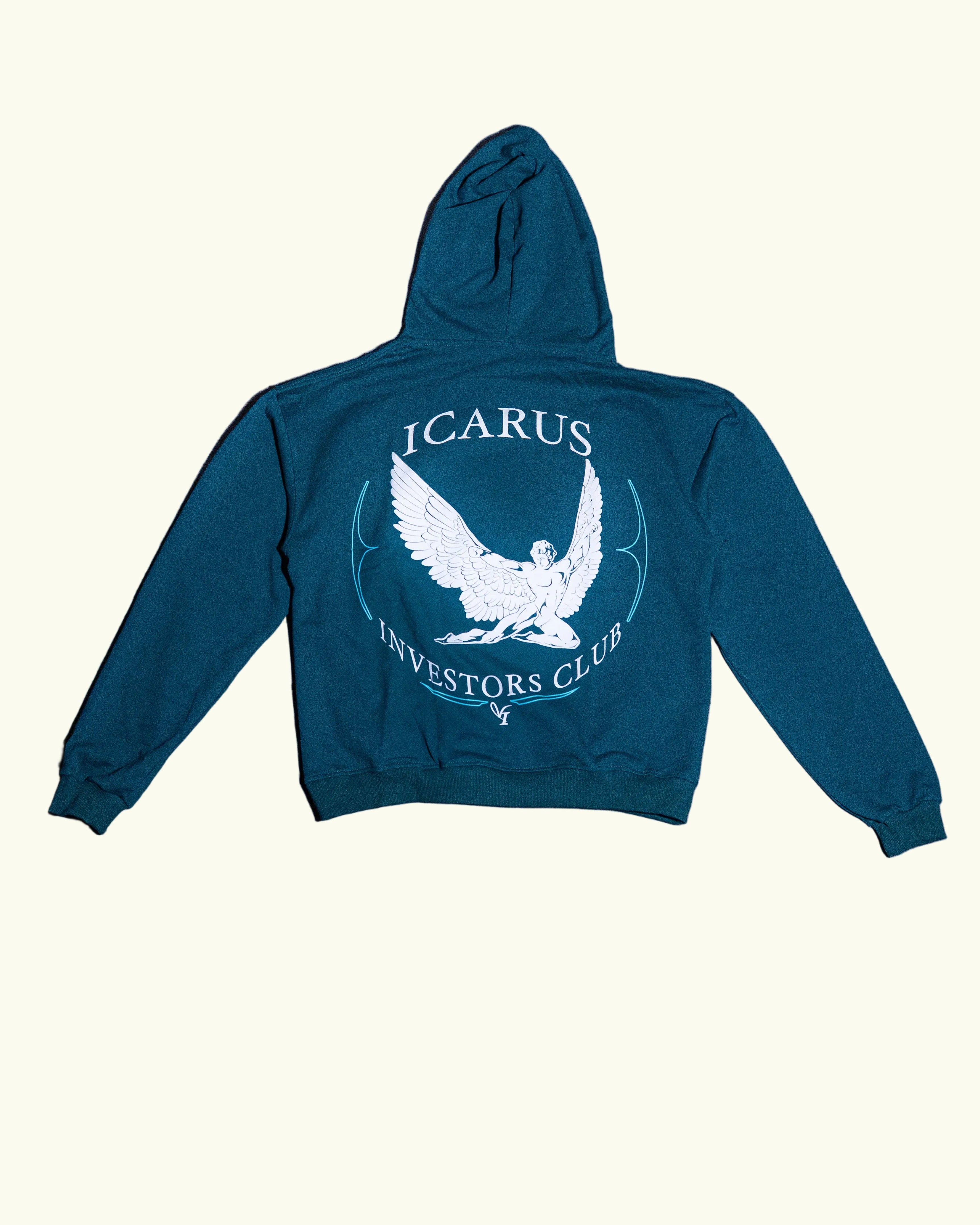 Green hoodie with 'Icarus Investors Club' design on a concrete floor.