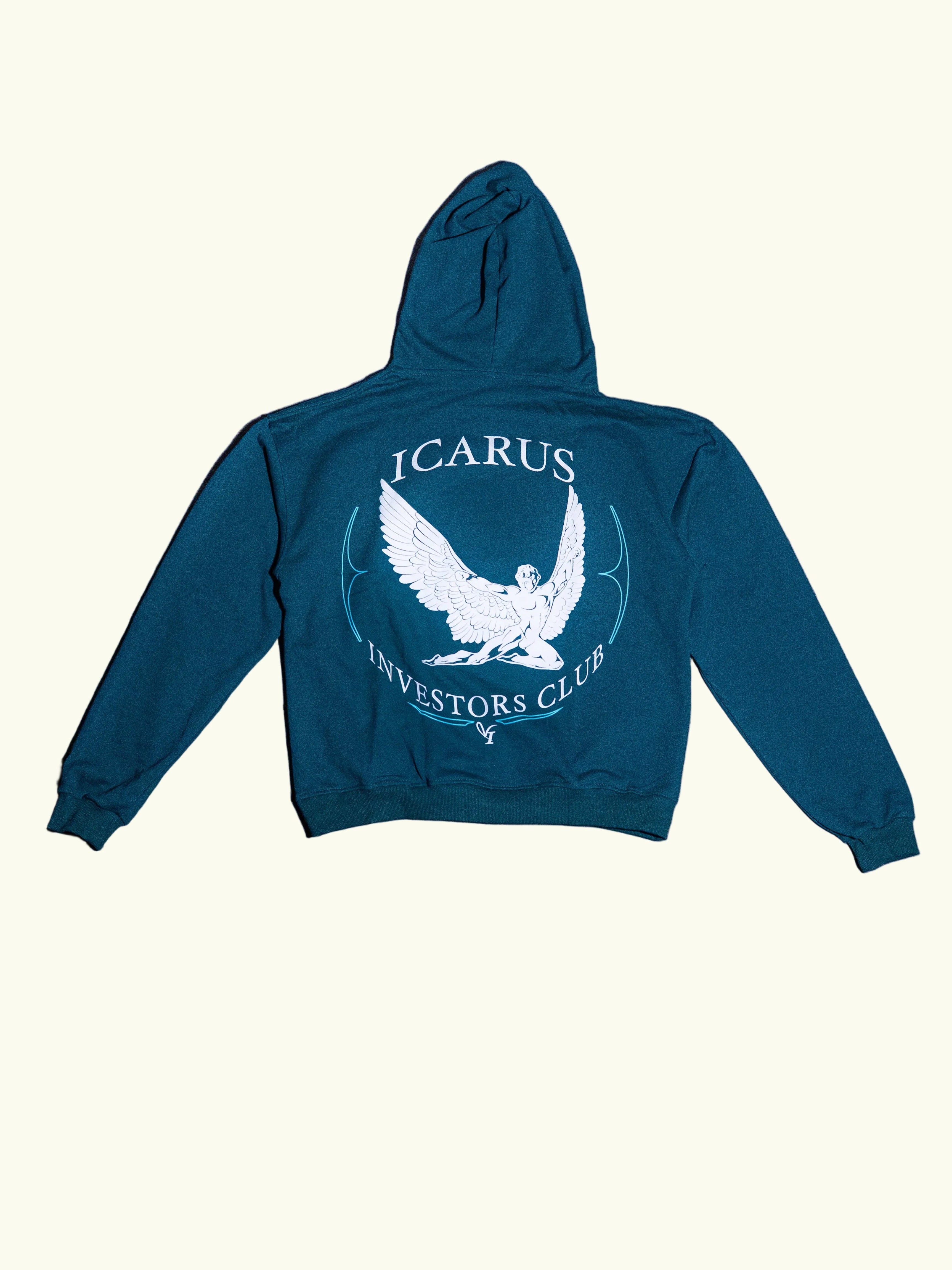 Green hoodie with 'Icarus Investors Club' design on a concrete floor.